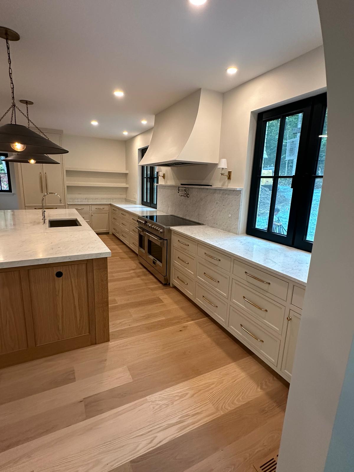 Modern kitchen finished by VR Corp Painting — cabinets and interior detail work